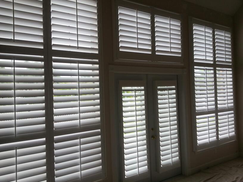 plantation window shutters - work nicely under arched windows